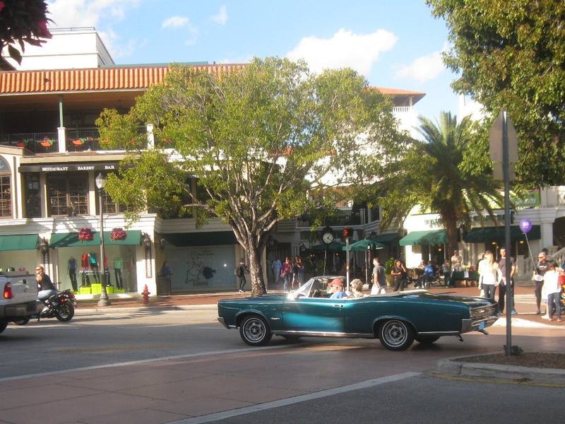 Shaded street in the Center Grove with a classic car at the curb